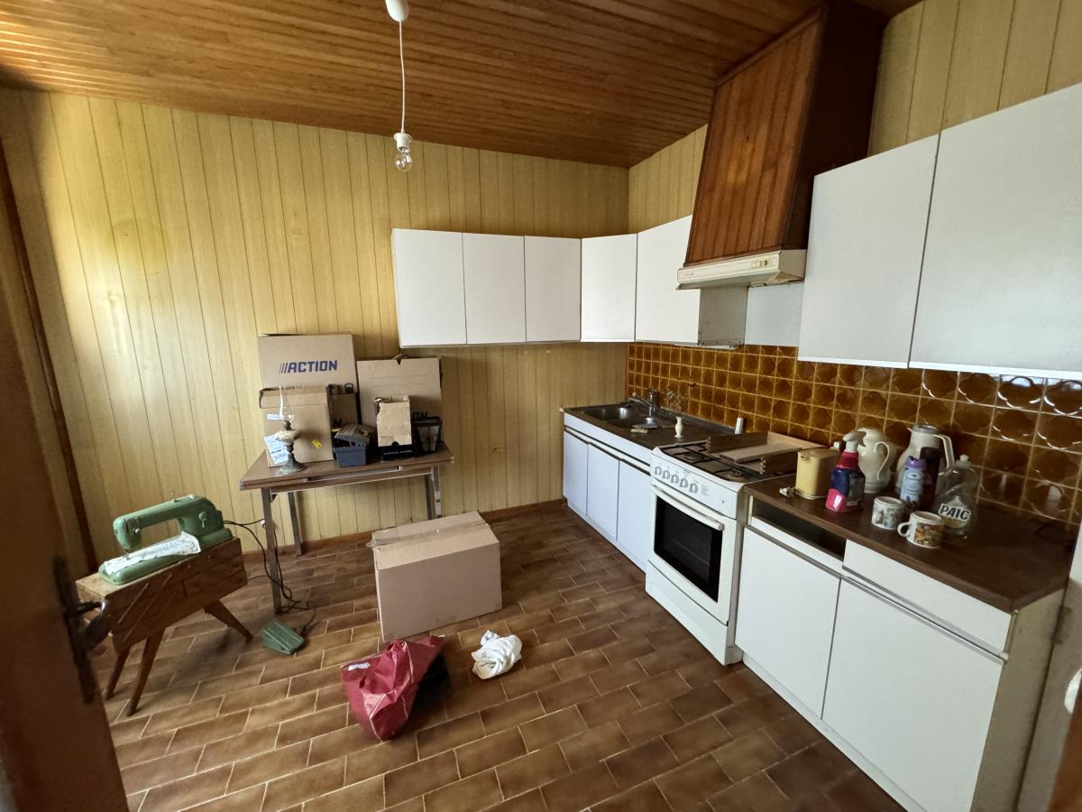 ONNAING Pavillon individuel semi plain pied 2 chambres avec passage sur le côté et garage