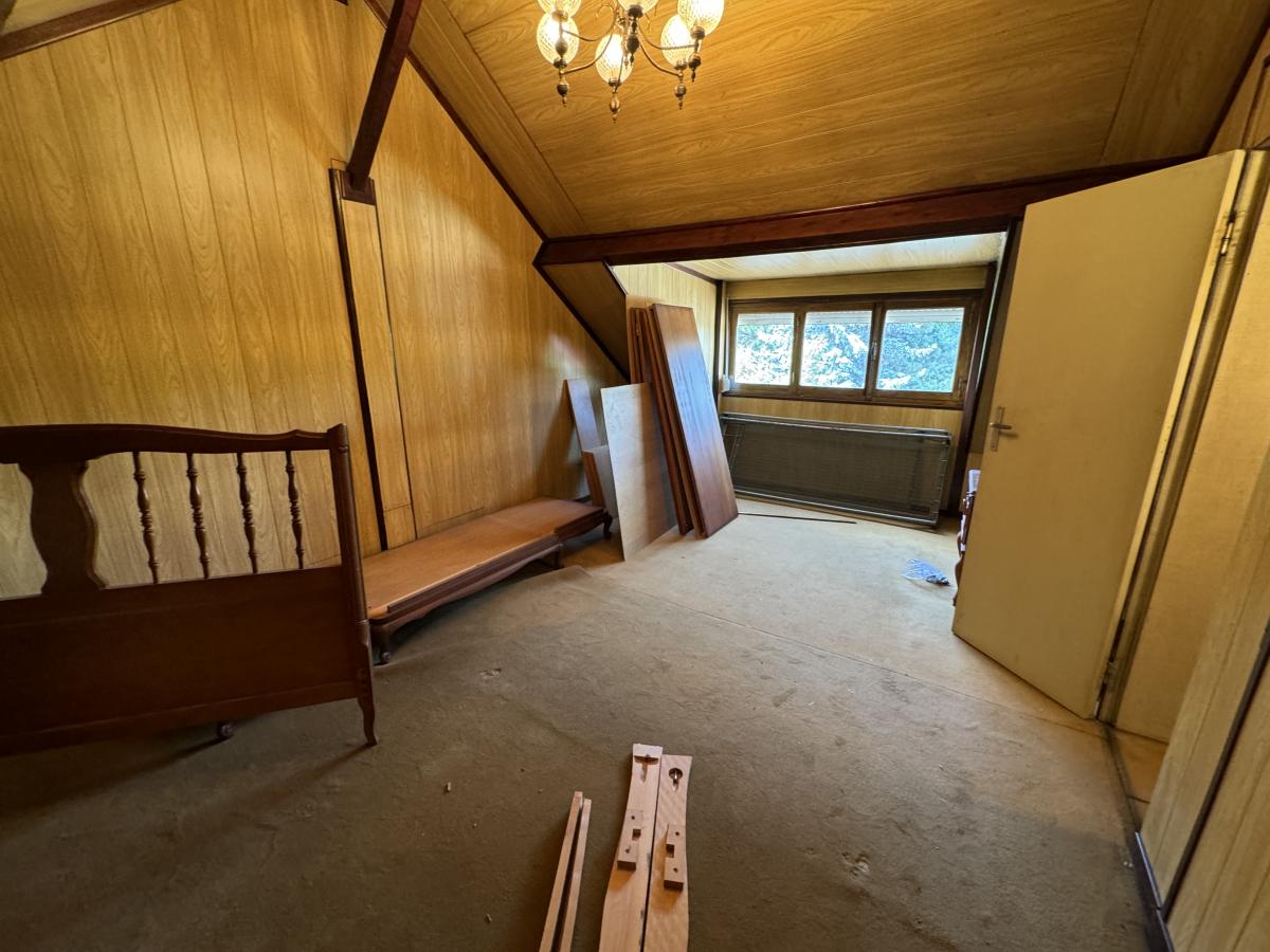 ONNAING Pavillon individuel semi plain pied 2 chambres avec passage sur le côté et garage